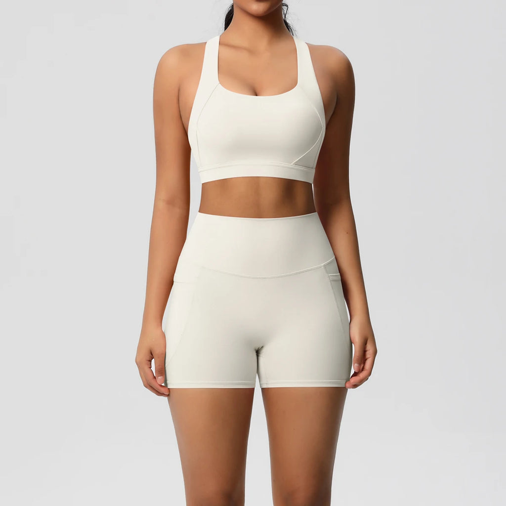 Pocketed Yoga Set – Sleeveless Top & Slim Ankle Leggings