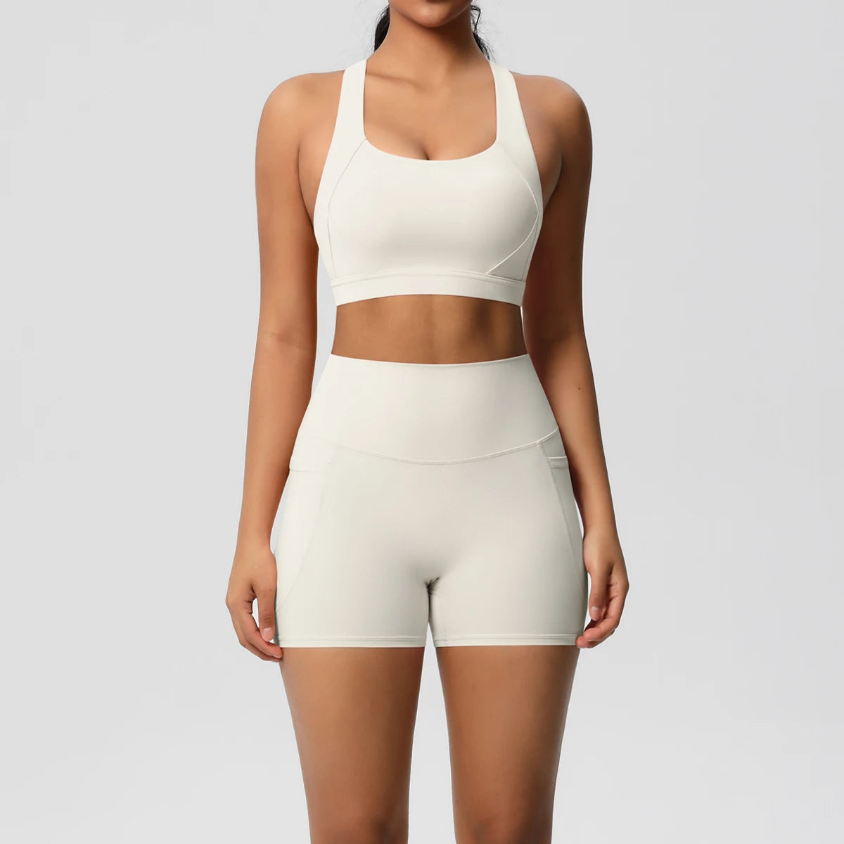 Pocketed Yoga Set – Sleeveless Top & Slim Ankle Leggings