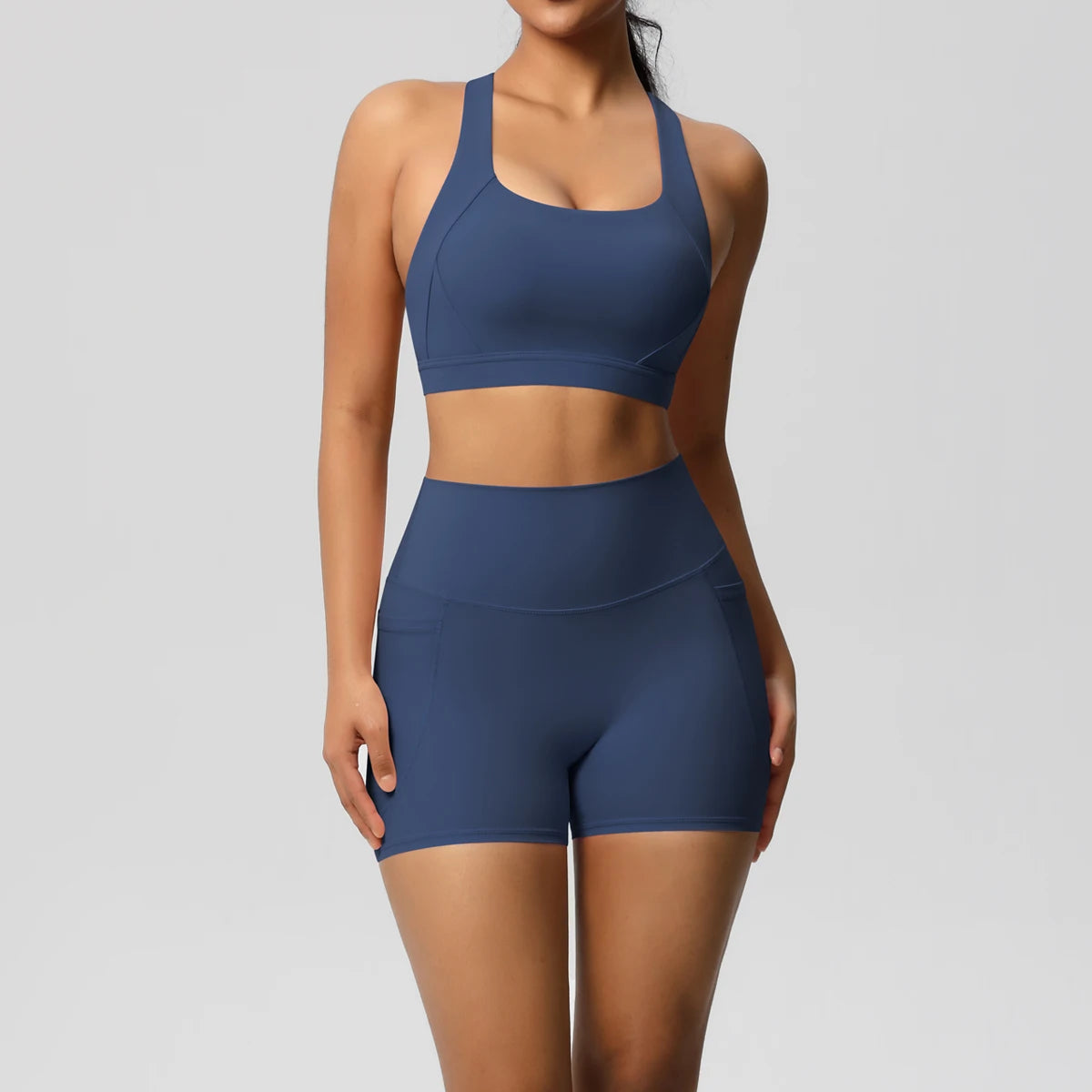 Pocketed Yoga Set – Sleeveless Top & Slim Ankle Leggings