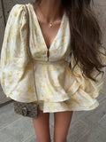 Women's Printed Bubble Sleeve Short Skirt Fashionable V-neck Hollow Waist Double Layered Dress 2026 Summer Commuting Street Wear