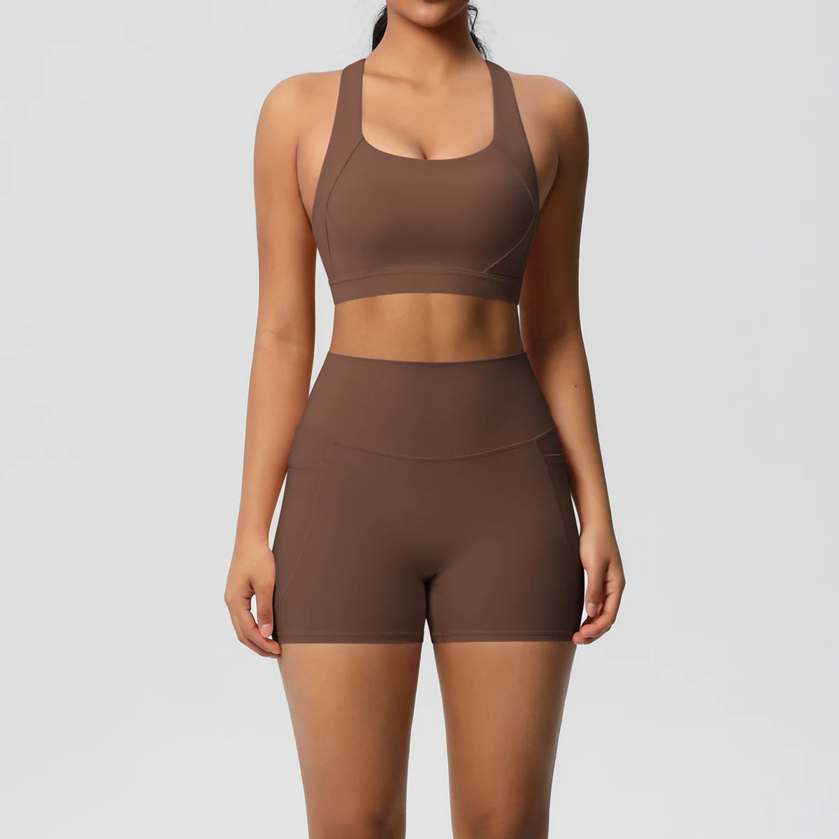 Pocketed Yoga Set – Sleeveless Top & Slim Ankle Leggings