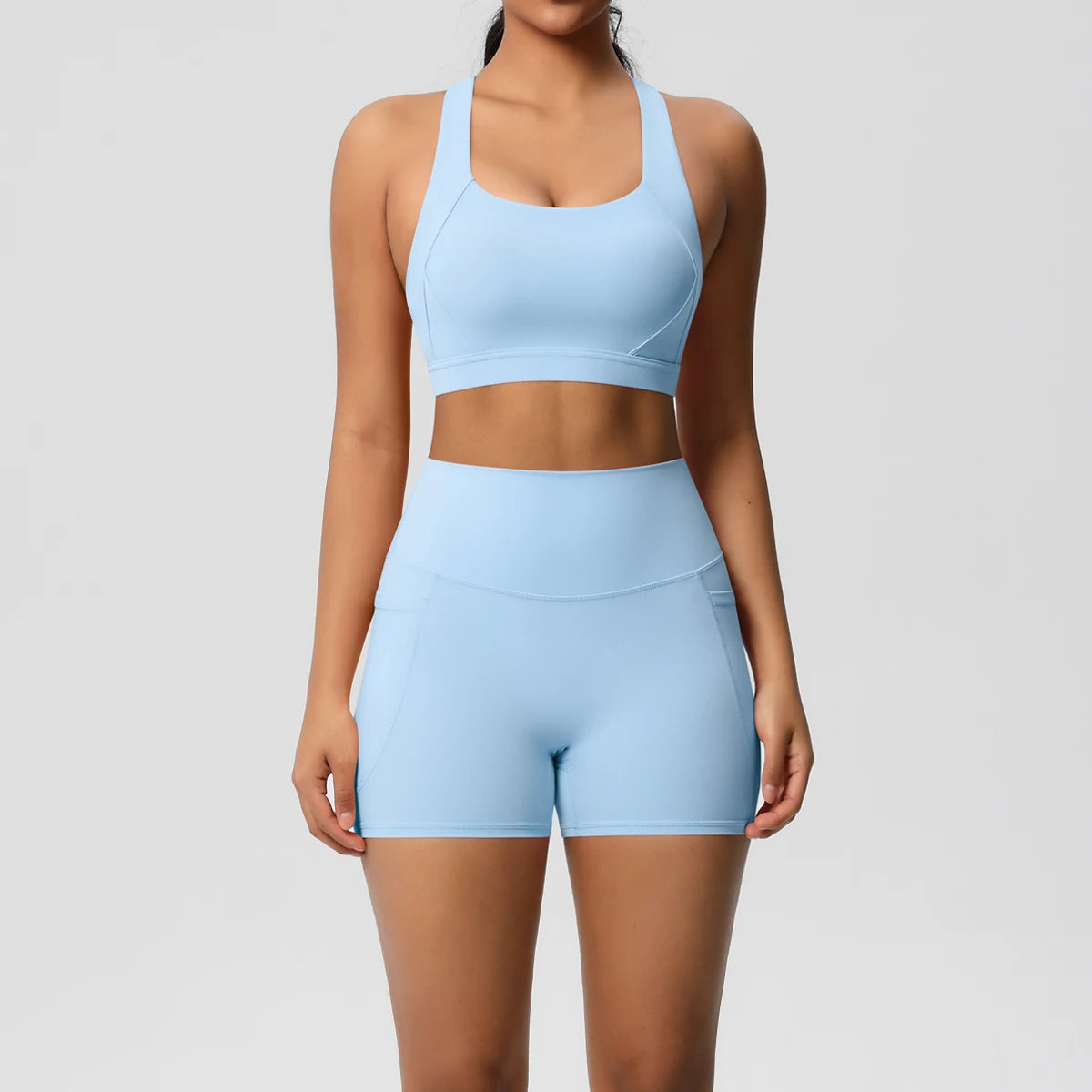 Pocketed Yoga Set – Sleeveless Top & Slim Ankle Leggings